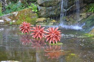 Award winning ceramic water sculpture by Michelle Maher - Symmetry at Blarney Castle, Co. Cork. Inspired by Dahlia and Coral forms, it was sculpted in my own grogged paper clay body and high fired in an electric kiln. Symmetry is now part of the permanent collection at Blarney Castle. www.ceramicforms.com