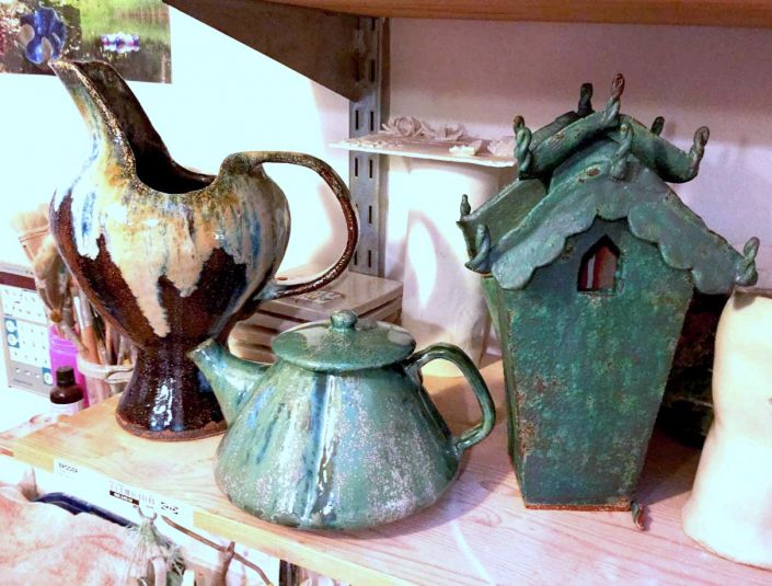 Collection of glazed student pieces at Dublin based ceramic class. Jug and teapot by Anna Turpin, spirit house by Rosemarie Connolly. All electric fired to 1260°C (Cone 8). www.ceramicforms.com