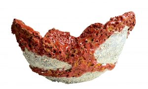 Red coral ceramic sculpture/vessel by Michelle Maher. This piece is inspired by coral and lichen surfaces. Combustible mixed media detail with volcanic glaze detail. Hand built in a grogged stoneware clay body and fired in an electric kiln to 1260°C (Cone 8). www.ceramicforms.com.