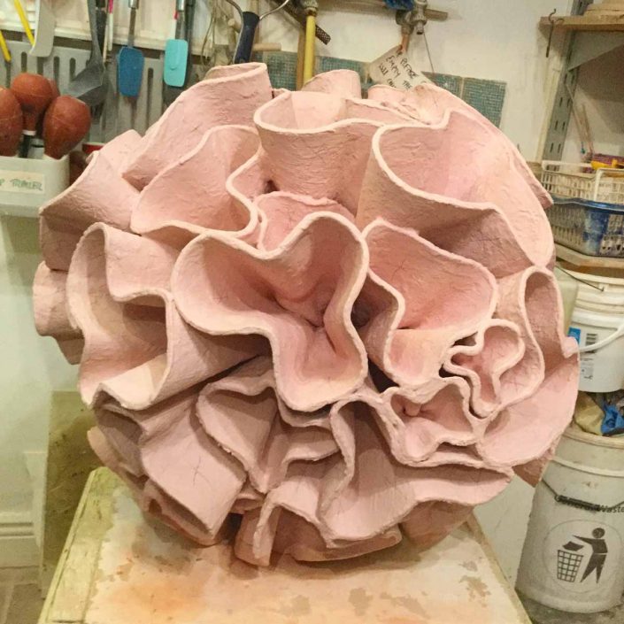 Ceramic water sculpture 'Synthesis' by Michelle Maher. Here is 'Synthesis' just before being loaded for the final glaze firing. This will be a dark red glaze after firing. Each bracket was sculpted individually. To be exhibited at Sculpture in Context 2016 at The National Botanic Gardens in Dublin. Inspired by fungi and coral forms, it was handmade in my own grogged paper clay body and high fired in an electric kiln to 1260°C (Cone 8). www.ceramicforms.com